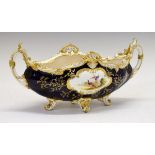 Coalport oval two handled jardinière, the reserve decorated with exotic birds on a heavily gilded