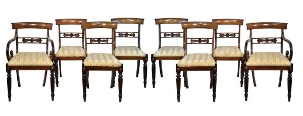 Set of eight William IV rosewood and simulated rosewood yoke back dining chairs, each having a