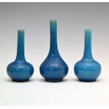 Three Japanese turquoise glazed earthenware spill vases, 12cm, 12.5cm and 14.75cm high Condition: