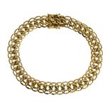 Bracelet of double curb links, stamped '585', 19cm long, 27g gross Condition: Width of bracelet