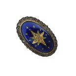 Diamond and enamel 18ct gold ring, the large oval head star set with diamonds to a domed blue