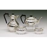 Edward VII/George V silver four piece tea set having engraved ribbon and swag decoration, makers