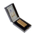 Dunhill silver gilt cased gas cigarette lighter, cased Condition: We do not guarantee the full