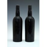 Dow's Vintage Port 1960, two bottles (2) Condition: Seals intact and levels good, produced without a