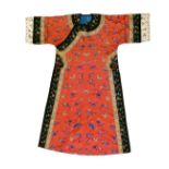 Chinese embroidered silk Mandarin style robe, typically decorated with butterflies and foliate