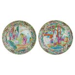 Two Cantonese Famille Rose plates, each typically decorated with figures on a terrace within a