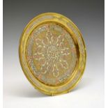 Indian brass dish with silver and copper stylised foliate decoration, 30.5cm diameter Condition: **