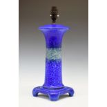 Ruskin mottled blue, green and yellow table lamp of column form, standing on a square foot, base