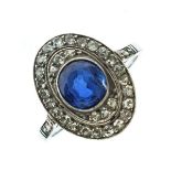 French sapphire and diamond panel ring, the oval cut stone enclosed by single cut diamonds, pair
