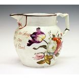 Early 19th Century pearl ware documentary jug, possibly Bristol, having polychrome painted foliate