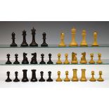 Jaques & Son boxwood and ebonised Staunton chess set, the white king with makers stamp, height of