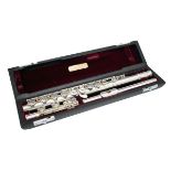 Modern silver flute by Iwao of Tokyo, stamped 'Silver', cased Condition: **General condition