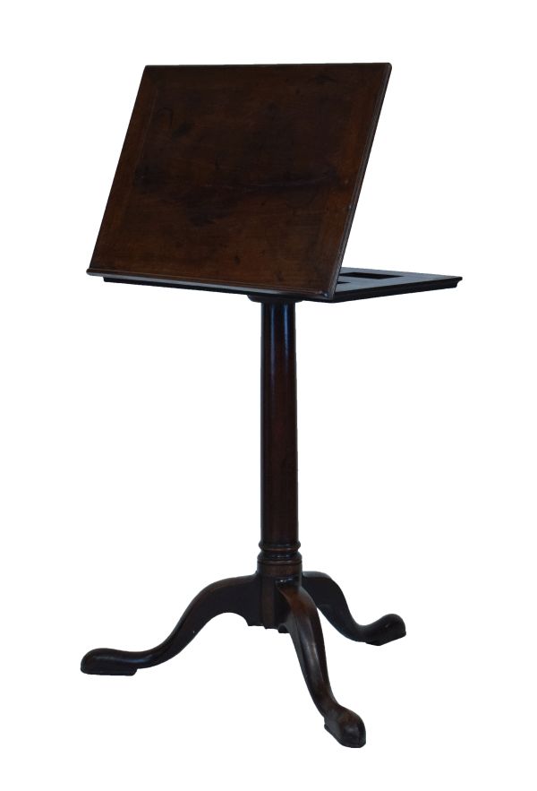 George III mahogany reading table having an adjustable rectangular top, standing on a tapered