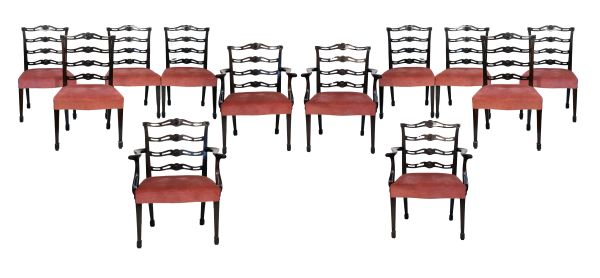 Set of twelve Georgian style mahogany dining chairs, each having a pierced ladder back, wide seat