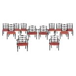Set of twelve Georgian style mahogany dining chairs, each having a pierced ladder back, wide seat
