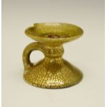 Elton Ware gold crackle on green glazed chamber candlestick, having a wide drip tray with upturned