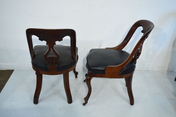 Eight Victorian Athenaeum style walnut spoon back dining chairs, each having a carved pierced - Image 3 of 7