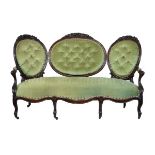 Victorian carved walnut framed triple cameo back sofa upholstered in pale green dralon and