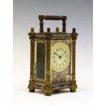 Late 19th Century French brass and enamel cased carriage clock, the case with a reeded pillar to