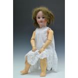 Large Schoenau & Hoffmeister bisque head child doll, having sleeping eyes and open mouth, jointed