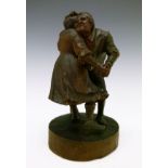 Black Forest type carved wooden figure depicting a pair of dancing villagers, 19cm high Condition:
