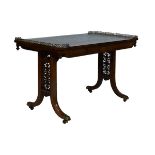 Regency rosewood library table, the rectangular top with partial brass gallery, inset writing