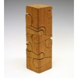 Modern Design - Brian Wilsher - A wooden sculptural puzzle, unsigned, 25.25cm high A.R. Provenance -