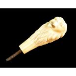 19th Century carved ivory parasol handle in the form of a lion's head, 7.75cm high Condition: