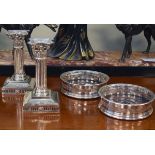 Pair of early 20th Century silver plated column design candlesticks, together with a pair of