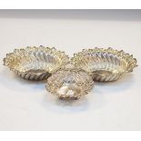 Pair of Victorian silver circular bon bon dishes having embossed decoration, Chester 1894,