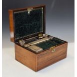 Victorian rosewood travelling toiletry case by Asser & Sherwin of London, the hinged cover opening