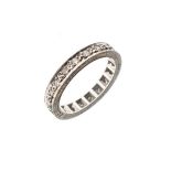 Diamond set eternity ring, the white metal shank stamped 18ct,, size J½ Condition: