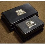 Two ebonised boxes, both having silver plated mount with a stylised Art Deco design stag motif