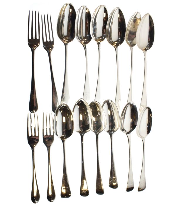 Twelve matched Georgian silver Old English pattern dessert spoons, together with four similar forks,