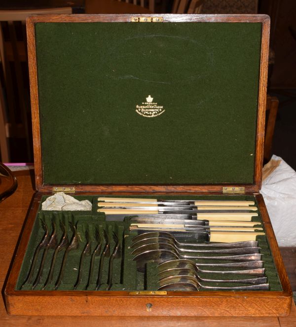 Oak cased canteen containing silver plated cutlery Condition: