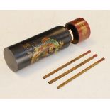 Chinese lacquered cylindrical case and cover decorated with a dragon and phoenix and containing