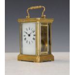 French brass cased carriage clock, the white enamel dial with Roman numerals Condition: