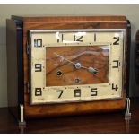 1930's period Art Deco style walnut cased mantel clock, the chapter ring having Arabic numerals