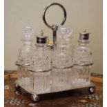 Silver plated and cut glass six bottle cruet Condition: