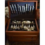 Canteen containing silver plated cutlery, the case with hinged cover and two drawers below