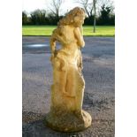 Composite stone figure of a standing female Condition: