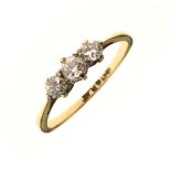 Graduated three stone diamond ring, the shank stamped 18ct and Plat, size N Condition: