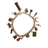 9ct gold curb link charm bracelet, attached various charms Condition: