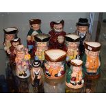 Eleven Royal Doulton toby jugs, 10.5cm - 23.5cm high Condition: