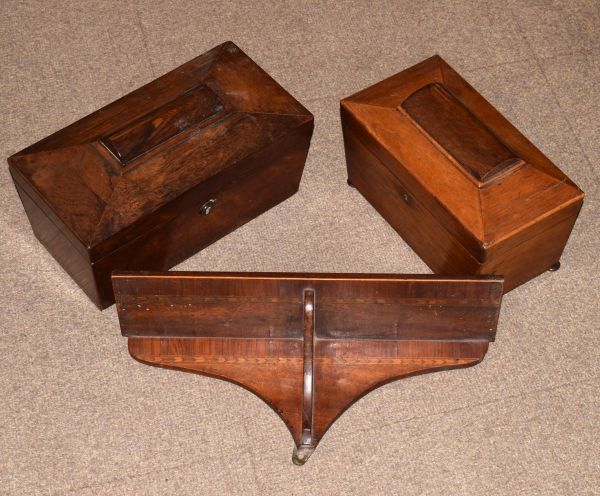 Two Victorian sarcophagus shaped tea caddies and an inlaid mahogany wall shelf Condition: