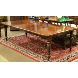 Victorian mahogany rectangular top extending dining table fitted two insertions and standing on