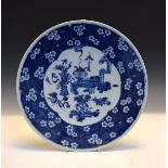 Japanese porcelain charger having blue and white painted decoration Condition: