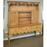 Reproduction Victorian style natural pine high dresser, the upper section fitted open shelves,