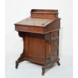 Late 19th Century oak davenport, fitted three real and three dummy drawers Condition: