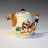 Mid 20th Century teapot decorated with hunting scenes in relief Condition: